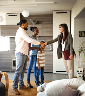 WRA Magazine Mar 2024 — Buyer Family Shaking Hands with Real Estate Agent